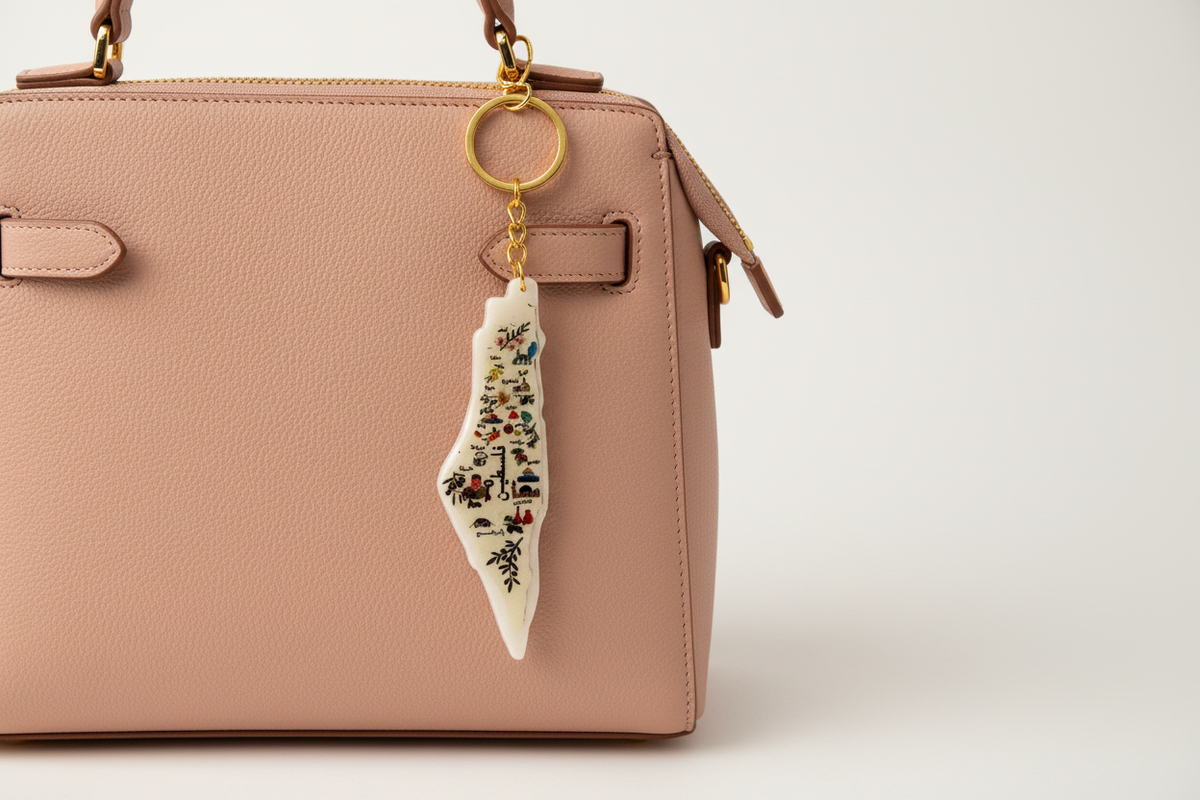 Palestinian keychain on women's bag overhead